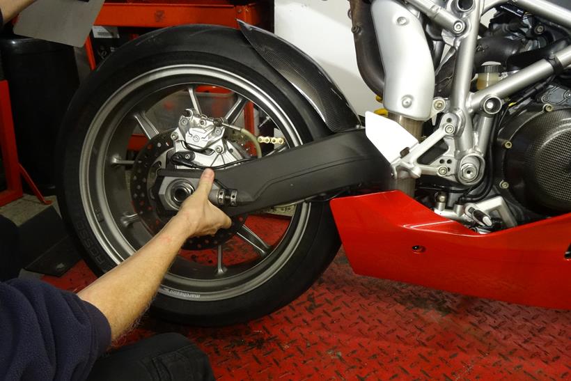 Checking a motorcycle swingarm pivot bearing