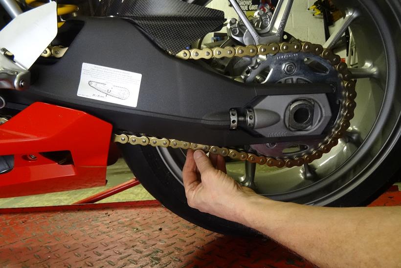 Checking a motorbike chain