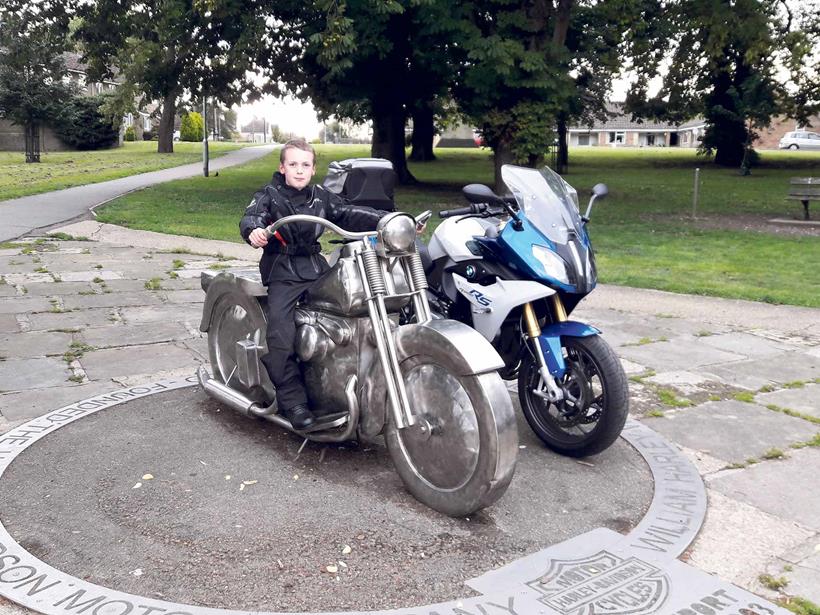 Alfie Nichols poses at a Harley-Davidson memorial