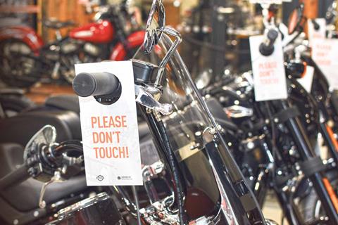 Playing it safe: Reopened showrooms kitted out with sanitisers for biking's 'new normal'