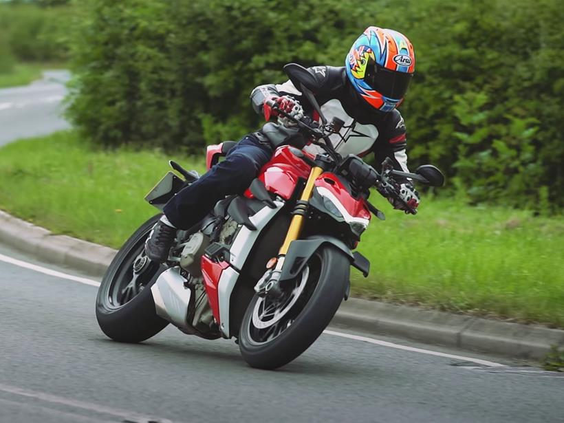 Michael Neeves riding his bike on the road like a true professional road tester