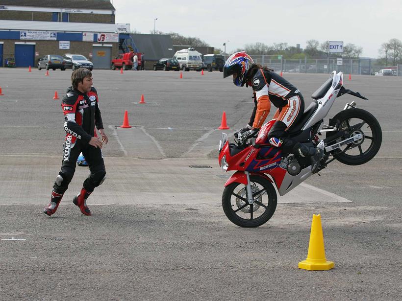 Honda CBR125R stoppie with Ron Haslam