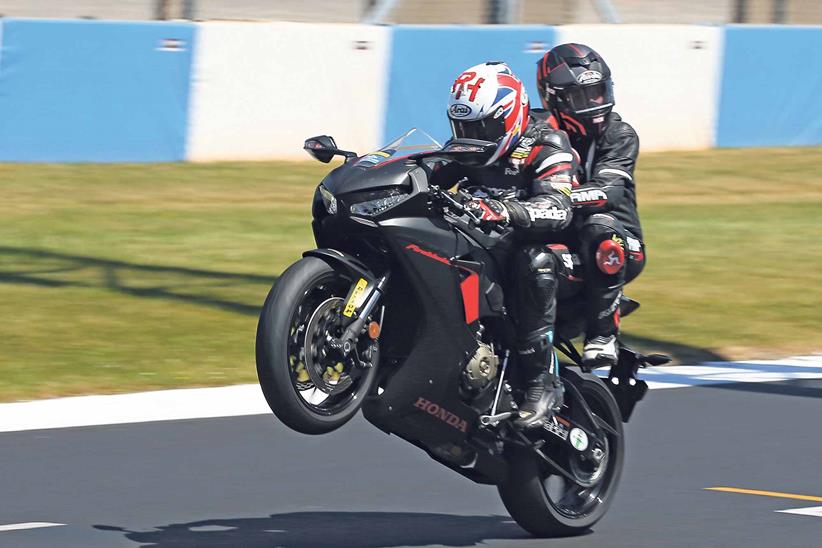 Pillion wheelie with Ron Haslam