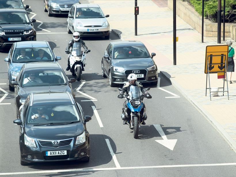 Filtering on a motorbike through traffic - explained here