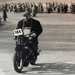 Captain Sir Tom Moore rides a motorcycle