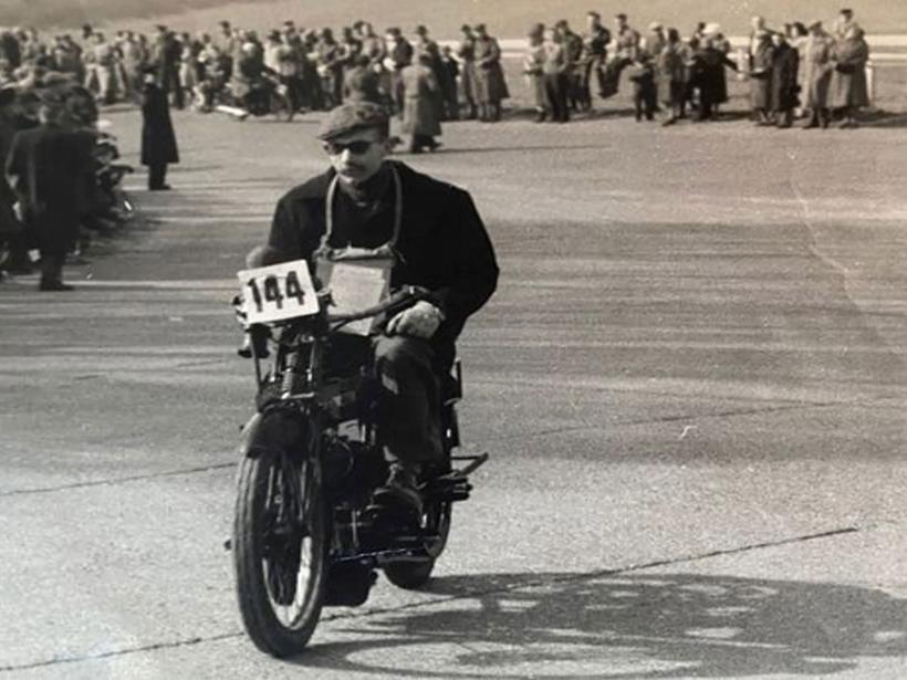 Captain Sir Tom Moore rides a motorcycle