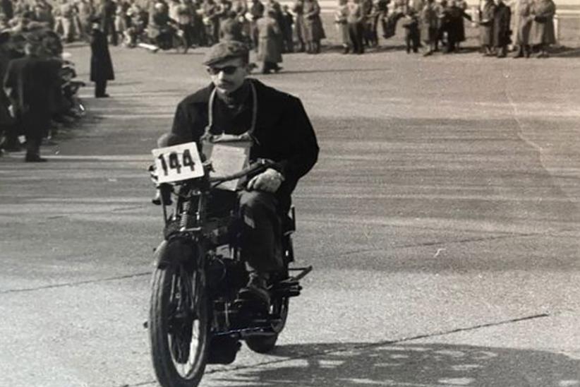 Captain Sir Tom Moore rides a motorcycle