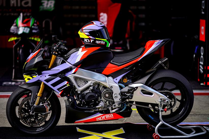 Aprilia Tuono V4 X with custom helmet