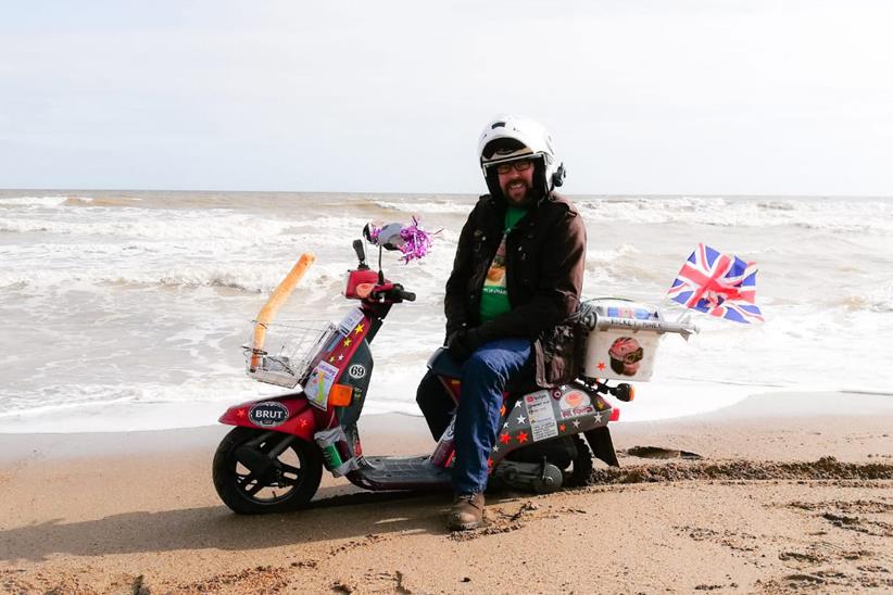 Riding the Honda Vision down Skegness beach