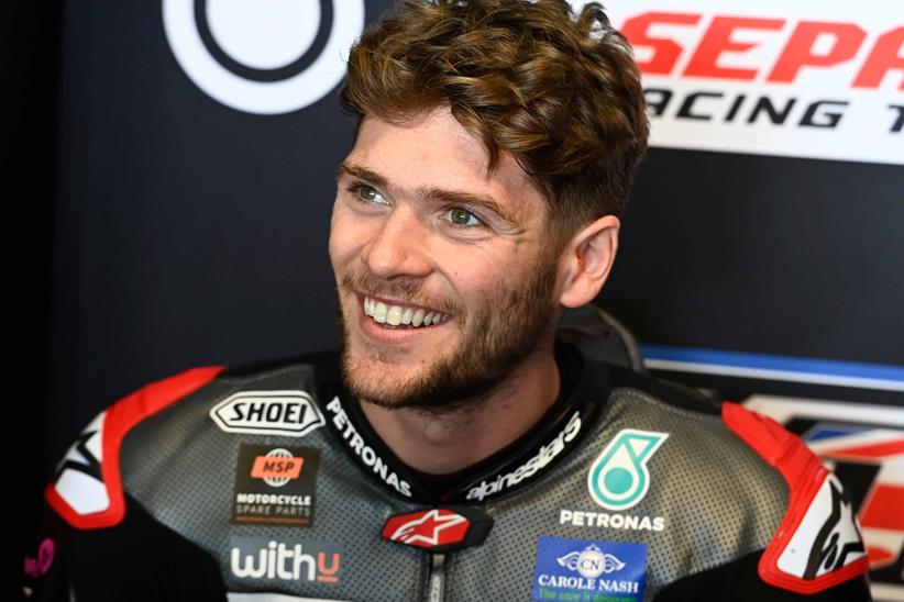 Jake Dixon will remain with the Petronas Sprinta Racing team in Moto2