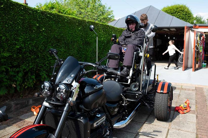 Kenny gets strapped in ready for a ride. Credit: Mark Freegard