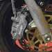 Dirty motorcycle brake caliper