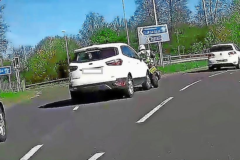 Footage of an incident between a motorbike and a car