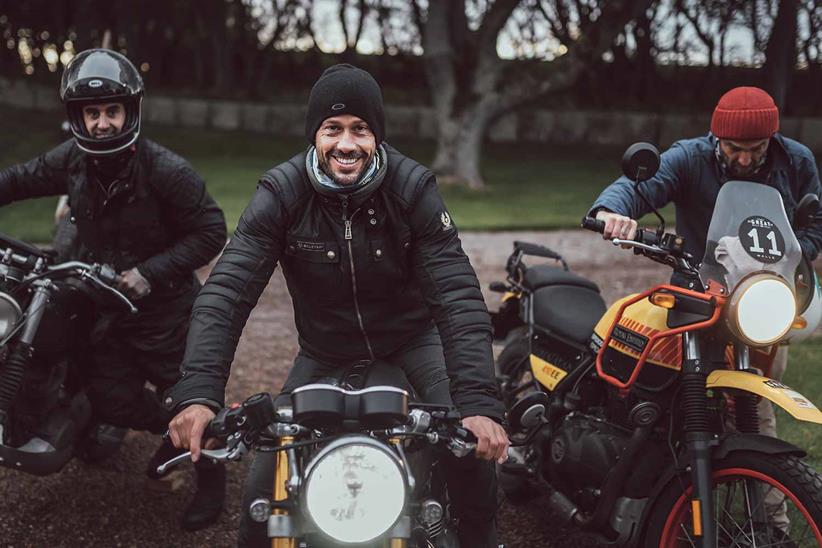 A trio of riders with their bikes