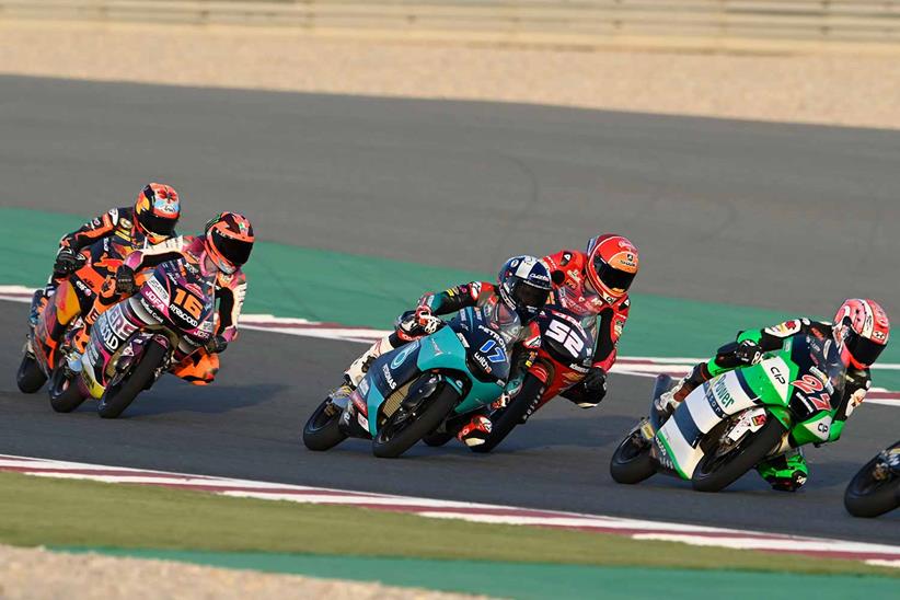 John McPhee (17) battles Jeremy Alcoba (52) at Losail