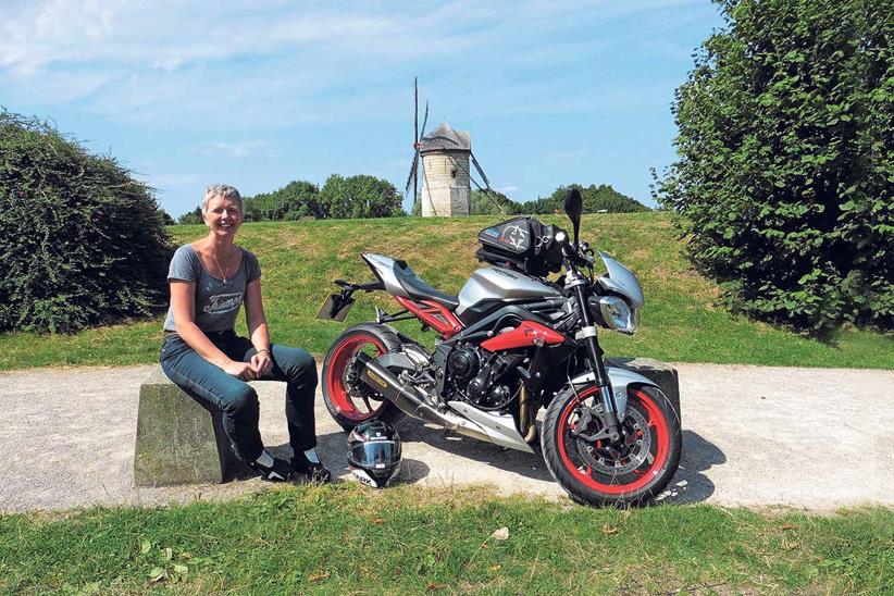 Stopping for a photo with windmills in France