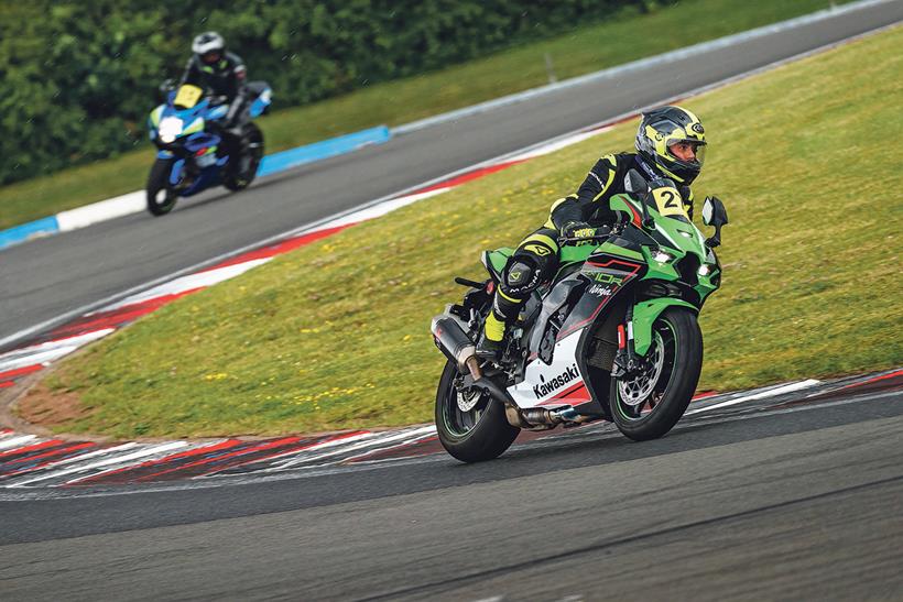 Kawasaki ZX-10R turning left on track