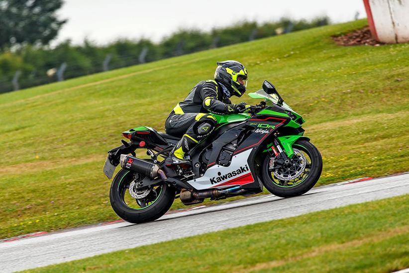 Kawasaki ZX-10R on track at a wet Donington