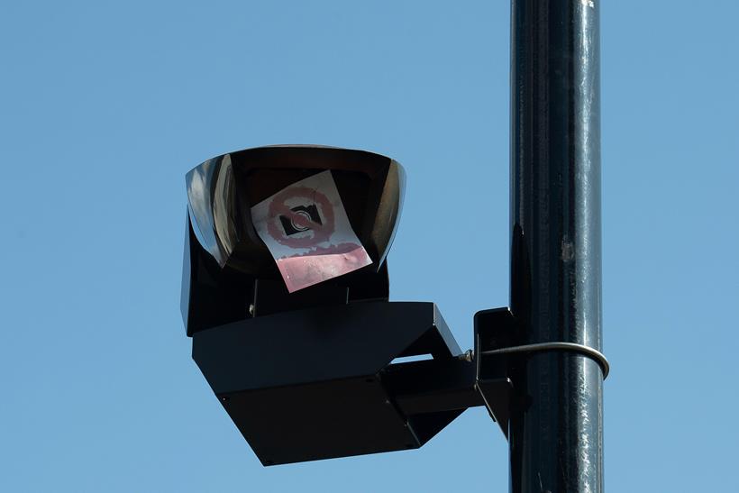 A ULEZ camera vandalised with sticker