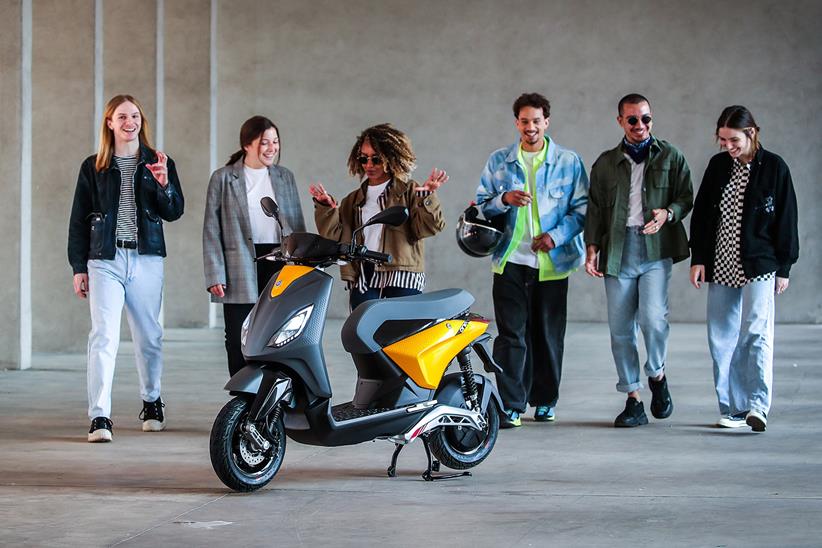 Piaggio One electric scooter and young people