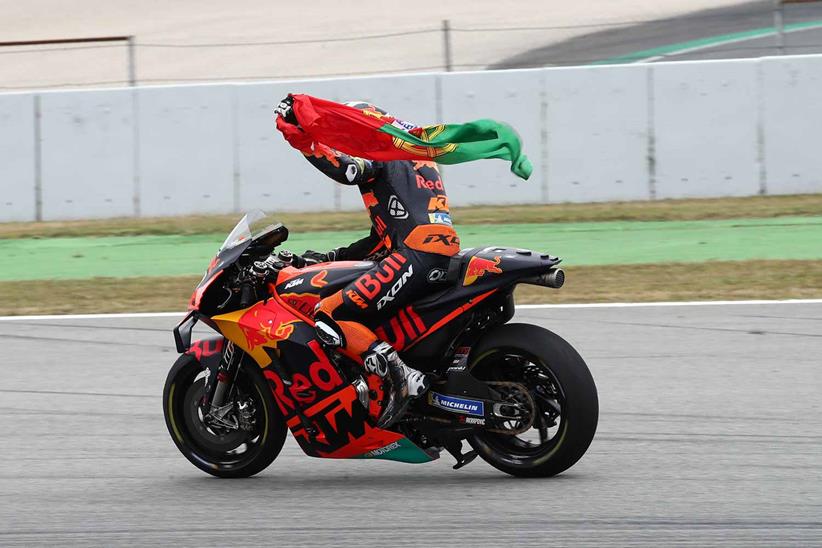 Miguel Oliveira celebrates with the Portuguese flag