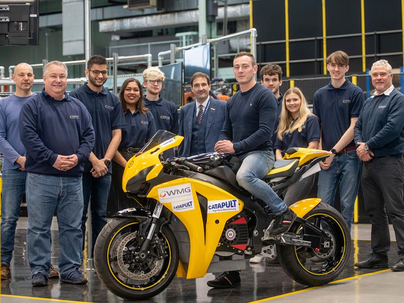 The Warwick Moto team pose with the bike before Covid