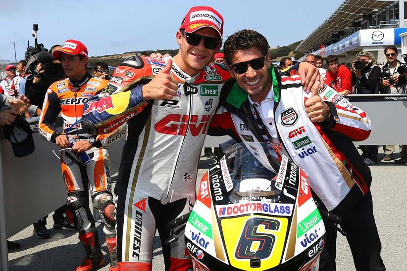 Lucio celebrates Stefan Bradl's podium at Laguna Seca in 2013