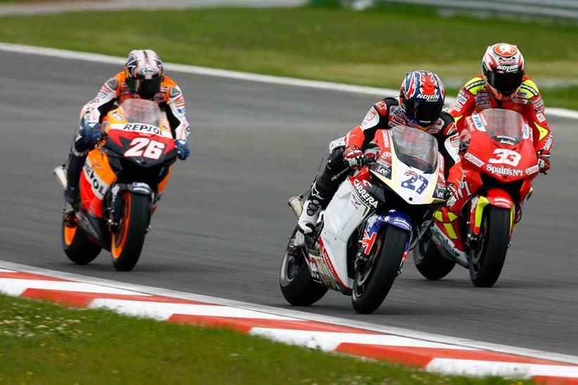 Stoner battles Marco Melandri and Casey Stoner for the win in Turkey (2006)