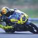 Rossi riding a 125