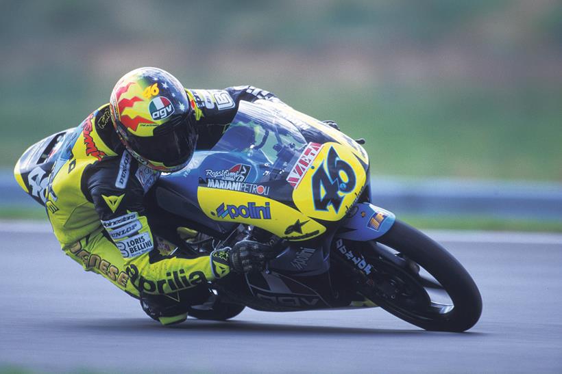 Rossi riding a 125