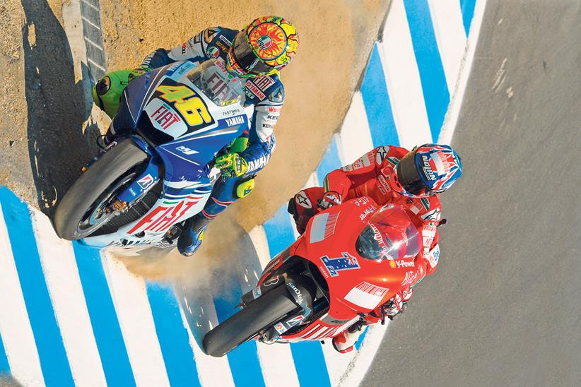 Rossi overtakes Casey Stoner on the Corkscrew at Laguna Seca