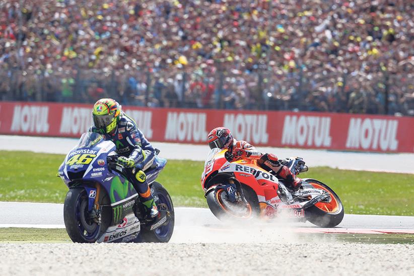 Rossi takes to the gravel during a battle with Marc Marquez