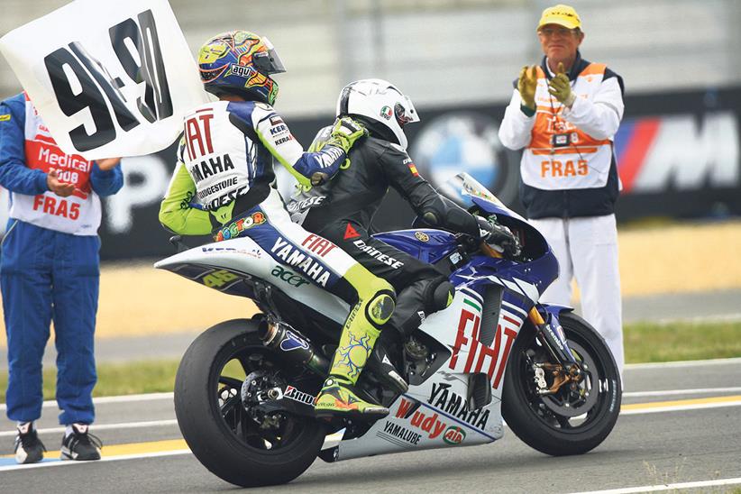 Rossi celebrates with Angel Nieto