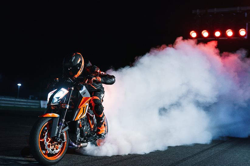 Performing a rolling burnout on the KTM 1290 Super Duke R Evo