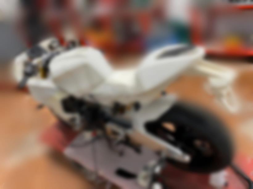 A blurred shot of a pre-production Bimota KB4