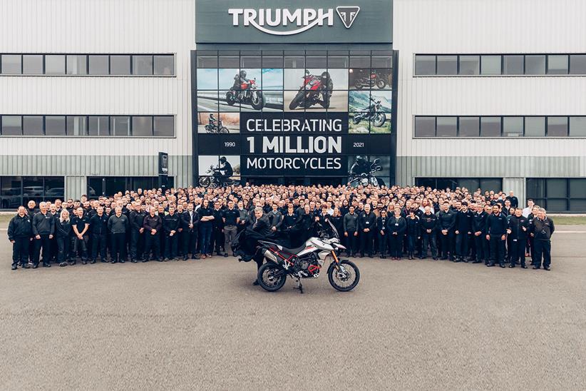 Triumph staff outside the factory with millionth bike produced