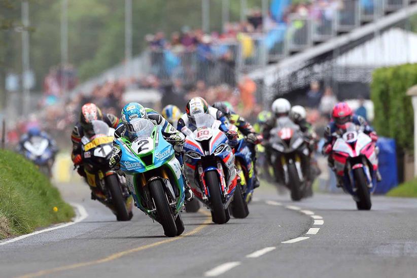 Dean Harrison (Silicone Kawasaki) gets the holeshot over eventful winner, Peter Hickman in the 2019 Superbike race