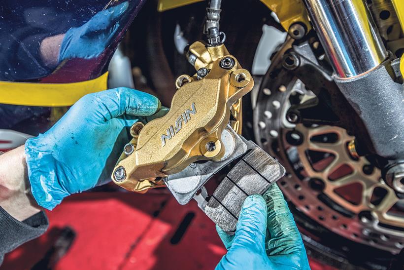 Refitting the pads into your brake calipers