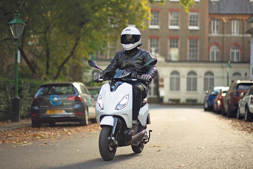 Riding an electric scooter in London