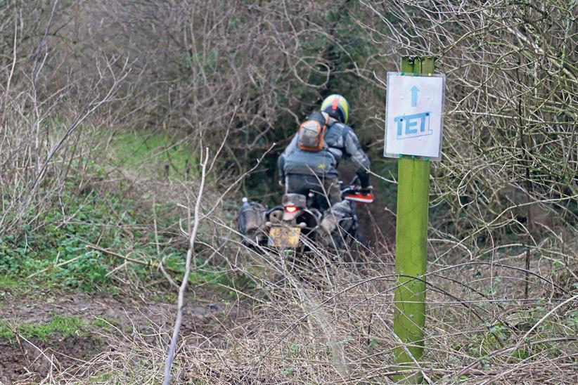 A rider takes on a green lane