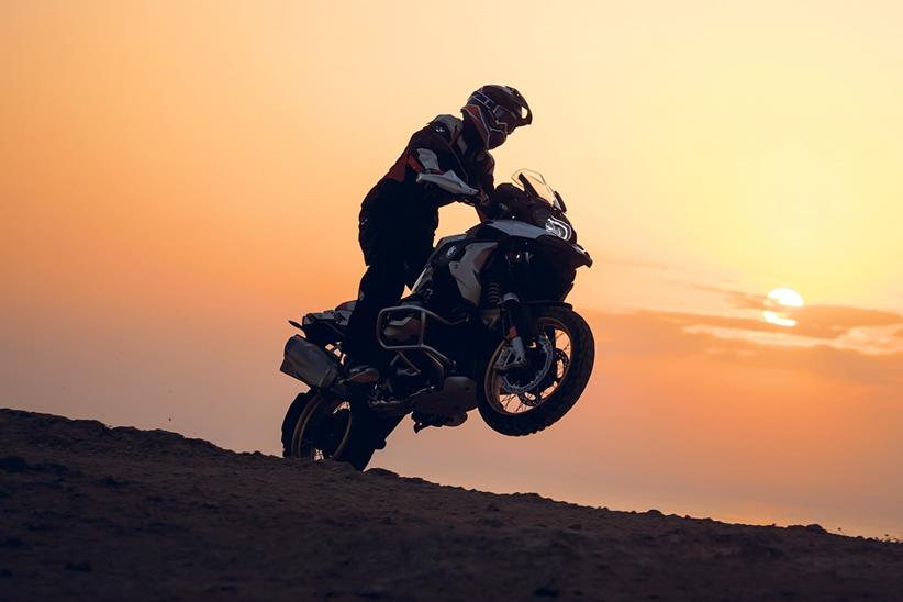 BMW R1250GS ridden at sunset